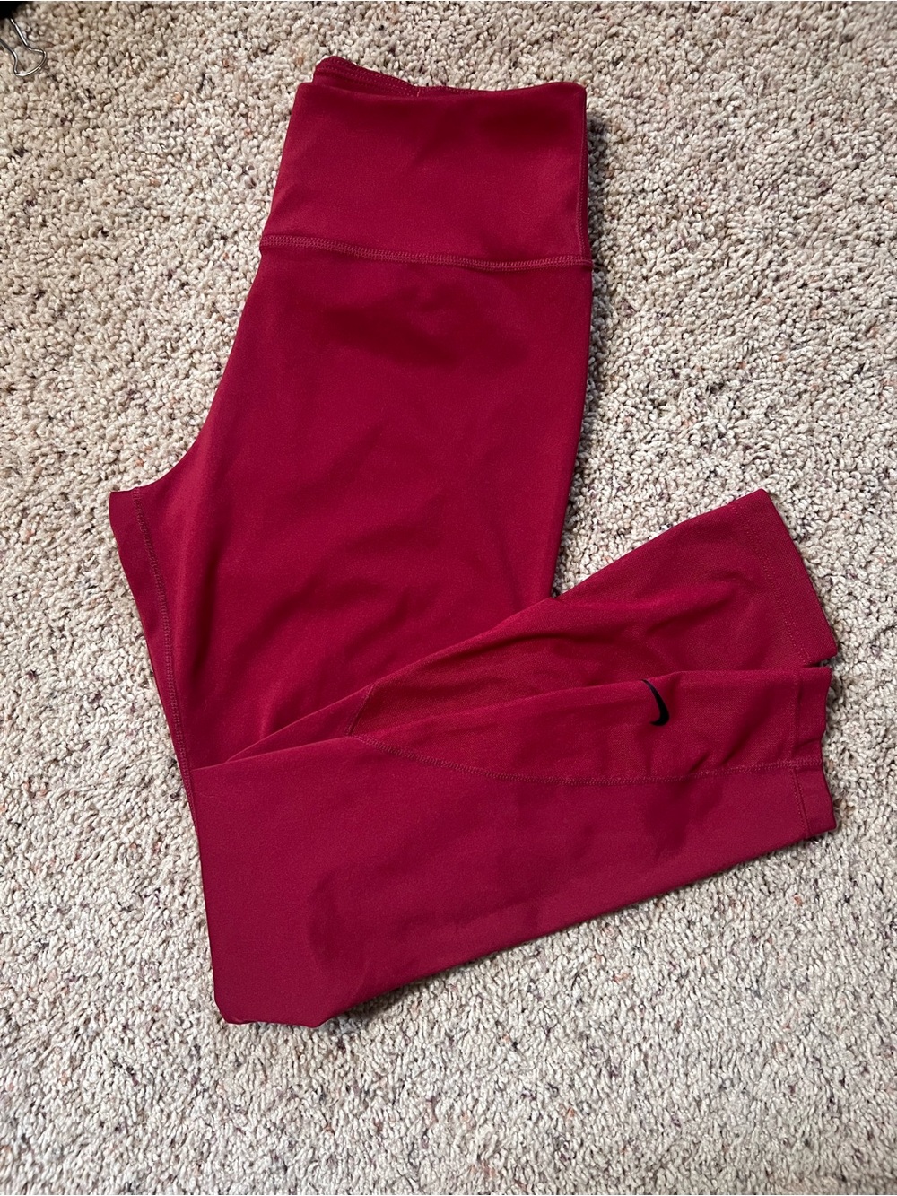 Nike dark red Performance Leggings with mesh panels on back of legs